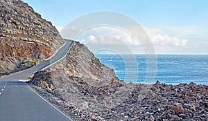 La Palma island mountain highway for a drive to the cliff top on a winding road by the ocean. Sight seeing by the coast