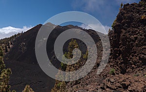 La Palma, long-range popular hiking route Ruta de Los Volcanes, landscapes around  black crater of El Duraznero