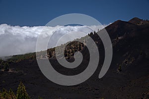 La Palma, long-range popular hiking route Ruta de Los Volcanes, landscapes around  black crater of El Duraznero