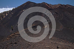 La Palma, long-range popular hiking route Ruta de Los Volcanes, landscapes around  black crater of El Duraznero