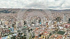 La Paz, Bolivia, aerial view flying over the dense, urban cityscape photo