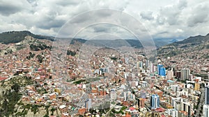 La Paz, Bolivia, aerial view flying over the dense, urban cityscape photo