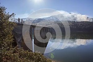 La Pesga bridge over Gabriel y Galan Reservoir waters, Spain photo