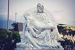 La Pieta statue - The blessed Virgin Mary holding dead Jesus Christ body