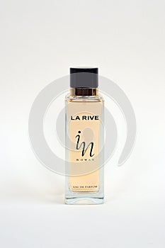 La rive IN woman perfume bottle on beige background. LA RIVE S.A. is one of the leading producers of perfumes and perfumed waters