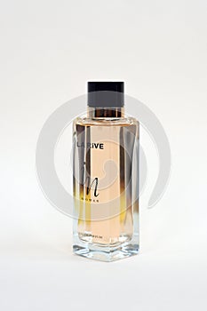 La rive IN woman perfume bottle on beige background. LA RIVE S.A. is one of the leading producers of perfumes and perfumed waters