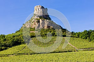 La Roche de SolutrÃ© with vineyards, Burgundy, France