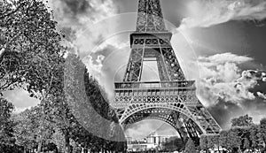 La Tour Eiffel, Paris. Tower sunset view with Champs de Mars gardens