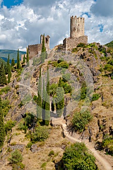 La Tour Regine and Cabaret towers with walking path at Lastours