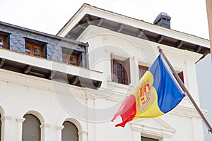 La Vella, Andorra. A Flag of Andorra hanging out in a street