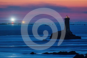 La Vieille lighthouse illuminated at night