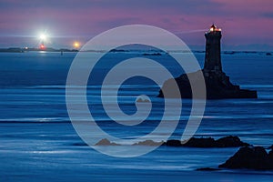 La Vieille lighthouse illuminated at night