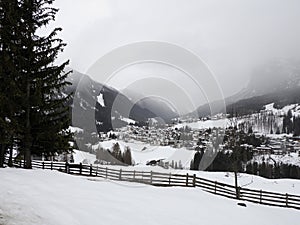 la villa village badia valley view on winter season dolomites Italy on snowy day