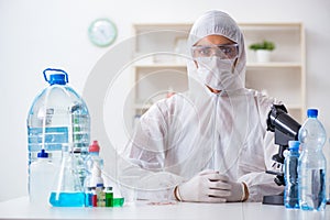 The lab assistant testing water quality