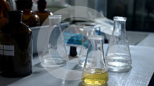 Lab flasks with chemical liquid.
