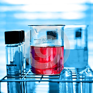 Lab glassware containing chemical liquid in laboratory