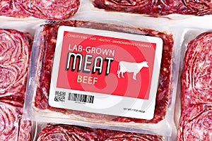 Lab grown cultured meat concept for artificial in vitro cell culture meat production with frozen packed raw meat with made up labe photo