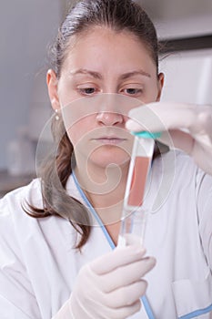 Lab scientist with petri dish