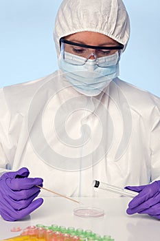 Lab technician taking a swab