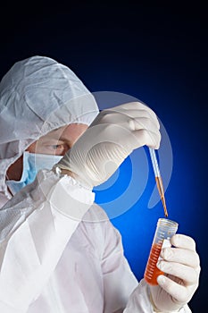 Lab worker testing a sample