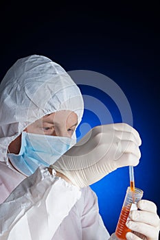 Lab worker testing a sample photo