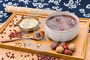 Laba porridge, Babao porridge, a gourmet dish in northern ChinaLaba porridge under the background of couplet red envelopeLaba porr