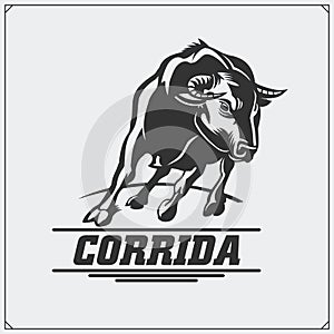 Label with aggressive bull. Corrida emblem. Vector illustration.