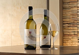 The label is elegant yet understatedâperhaps featuring delicate script or a minimalist vineyard emblem. photo
