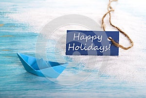 Label with Happy Holidays and Boat