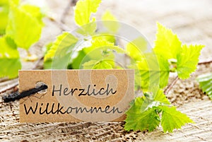 Label with Herzlich Willkommen