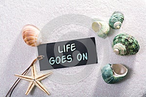 Label with life goes on