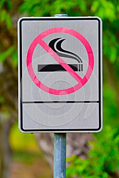 Label no smoking metal sign in the park