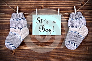 Label Saying It Is A Boy photo