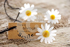 Label with Saying There is Always a Reason to Smile