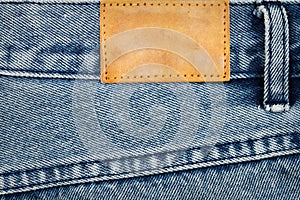 Label sewed on a blue jeans