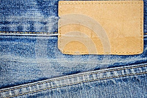 Label sewed on a blue jeans