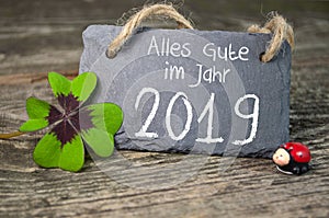 Label Sign and chalkboard with Happy New Year New Years Eve with 2019 and shamrock