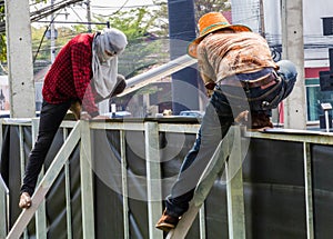 Label technician working install Daytime