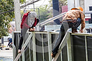 Label technician working install Daytime