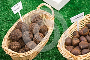 Labeled Baskets of Black Walnuts and Chestnuts