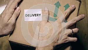 Labeling carton with DELIVERY sticker