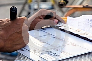 Labeling the Slate on set, film slate and film crew production set