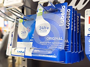 Labello original lip care display with recyclable packaging in store