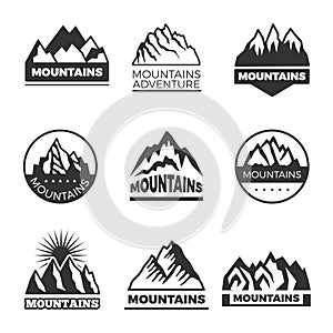 Labels set with different illustrations of mountains. Templates for logos design