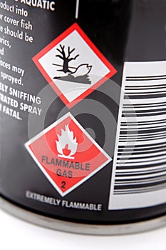 Labels on side of aerosol can