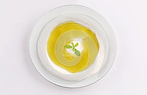 Labneh dish with olive oil top view