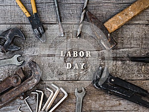 LABOR DAY. Hand tools and wooden letters
