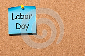 Labor day - notes pinned at corc board, 1st of May office background. With copy space for text, mockup or template