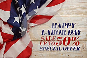 Labor Day Sale with American flags on wooden background