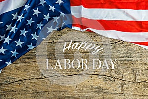 Labor Day Text Over Old Wood Wall Texture Background and American Flags